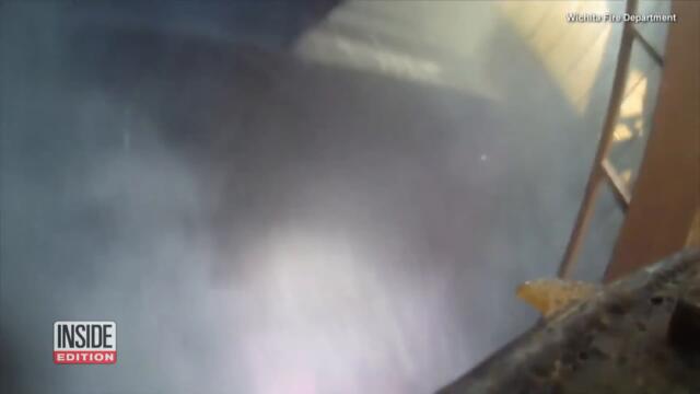 Firefighters Brave Flaming Building to Save Residents