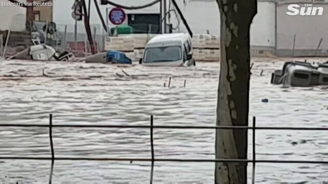 Cars swept away by flash floods in Spain, Almendralejo