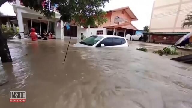 Rescuers Carry Flood Evacuees on Their Backs