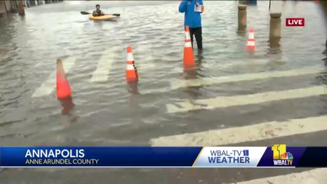 Kayakers paddle through flooding on Annapolis Main Street