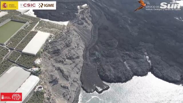 La Palma: Drone footage shows huge steaming headland formed by lava