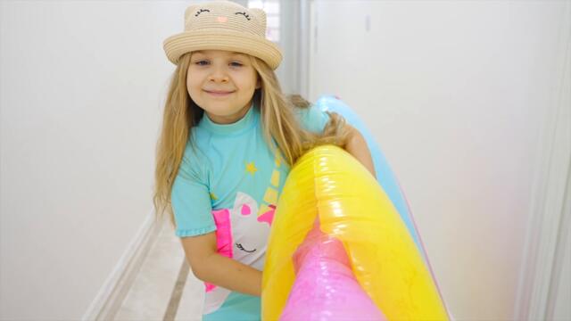 Diana learns how to swim safely with her parents supervision