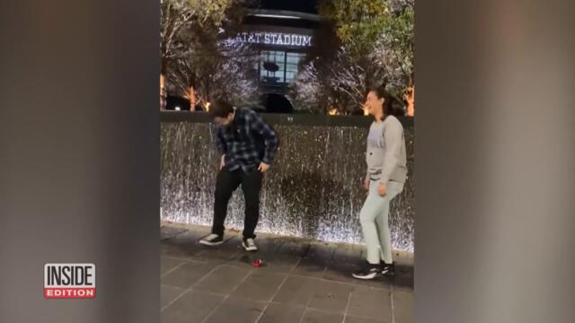 Man Proposing Drops Ring Into Fountain