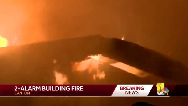 Flames rage from 2-alarm rowhome fire in Canton