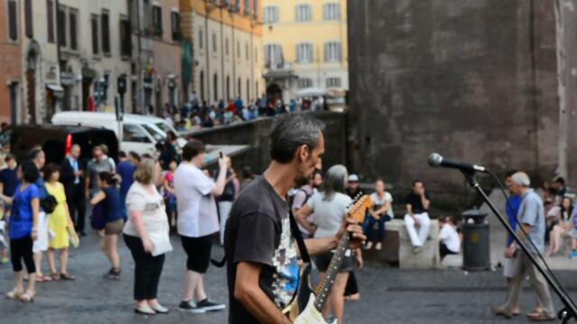 Time (Pink Floyd) by a street musician in Rome