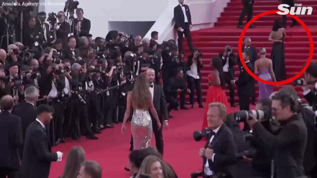 Topless Ukraine war protester crashes Cannes red carpet