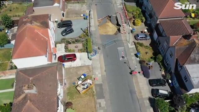 Huge 20ft sinkhole swallows motorbike in London street