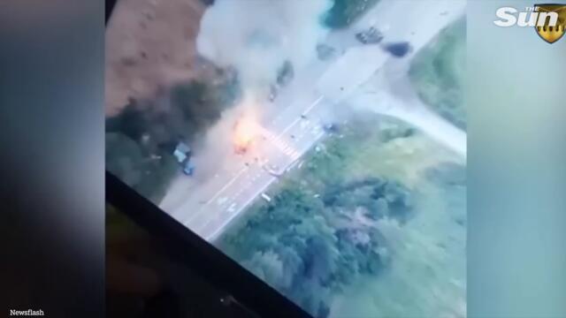 Ukrainian fighters destroy a Russian tank on a main road