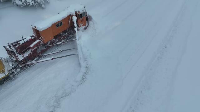 Train Plowing railroad tracks after winter storm - December 2022 - Donner Pass