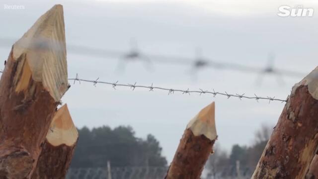 Ukrainian troops train in trenches on Belarus border ready for Russian attack