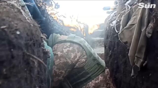 Ukrainian soldiers take up positions in trenches and dugouts to fight Russian forces