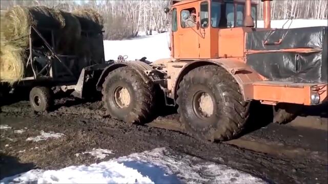 Кировец в работе. Засадили трактора в грязи.