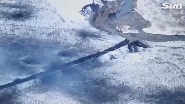 Ukrainian mortars blow up Russian troops hidden in snowy trenches