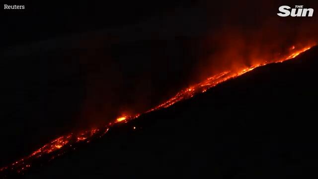 Spectacular scenes as lava erupts from snow-covered Mount Etna