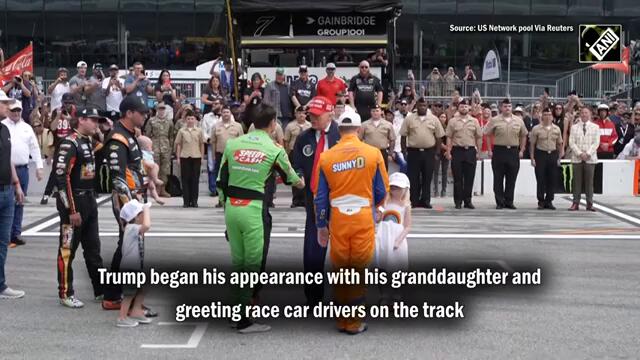 US President Donald Trump rides around Daytona 500 racetrack ahead of iconic event