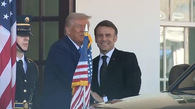 Donald Trump greets French President Emmanuel Macron at the White House