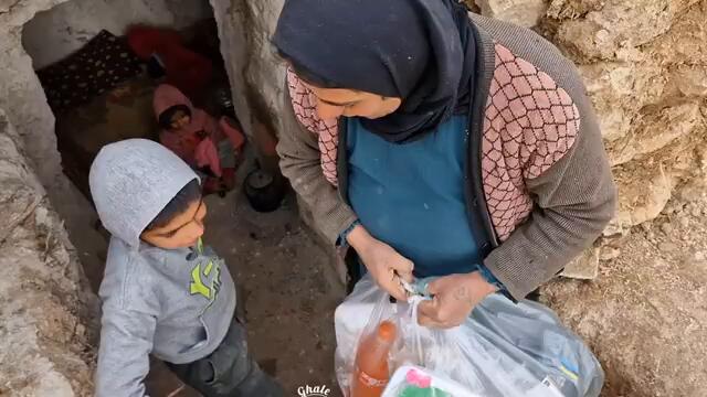Buying coats and toys for Marzieh and her children by the operator and viewer Mr Gabriela