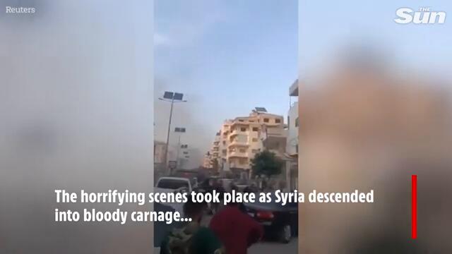 Moment gunmen open fire as violence rages in Syria with 1,000 slaughtered