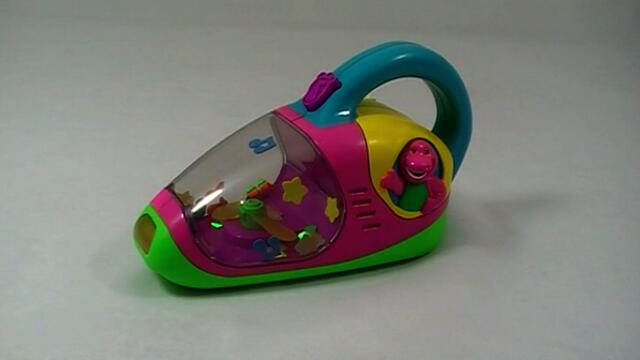 MATTEL ODKURZACZ Z DINOZAUREM I MUZYKĄ (M2350)